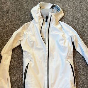 White and black Lululemon hooded rain jacket size 4